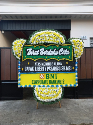 Papan Bunga Duka di Mila