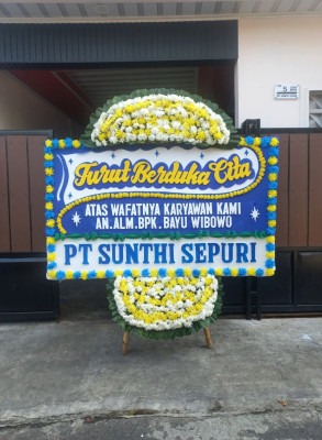 Papan Bunga Duka di Mila