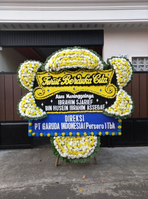 Papan Bunga Duka di Mila