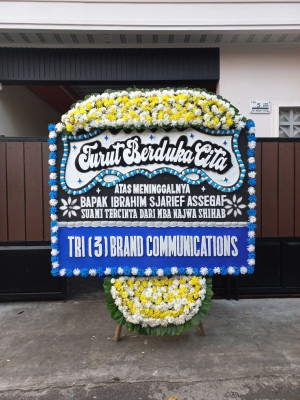 Papan Bunga Duka di Mila